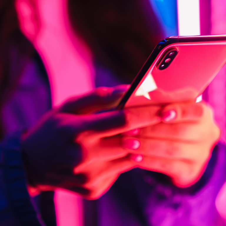 Social Strategy. Image of hands holding iphone